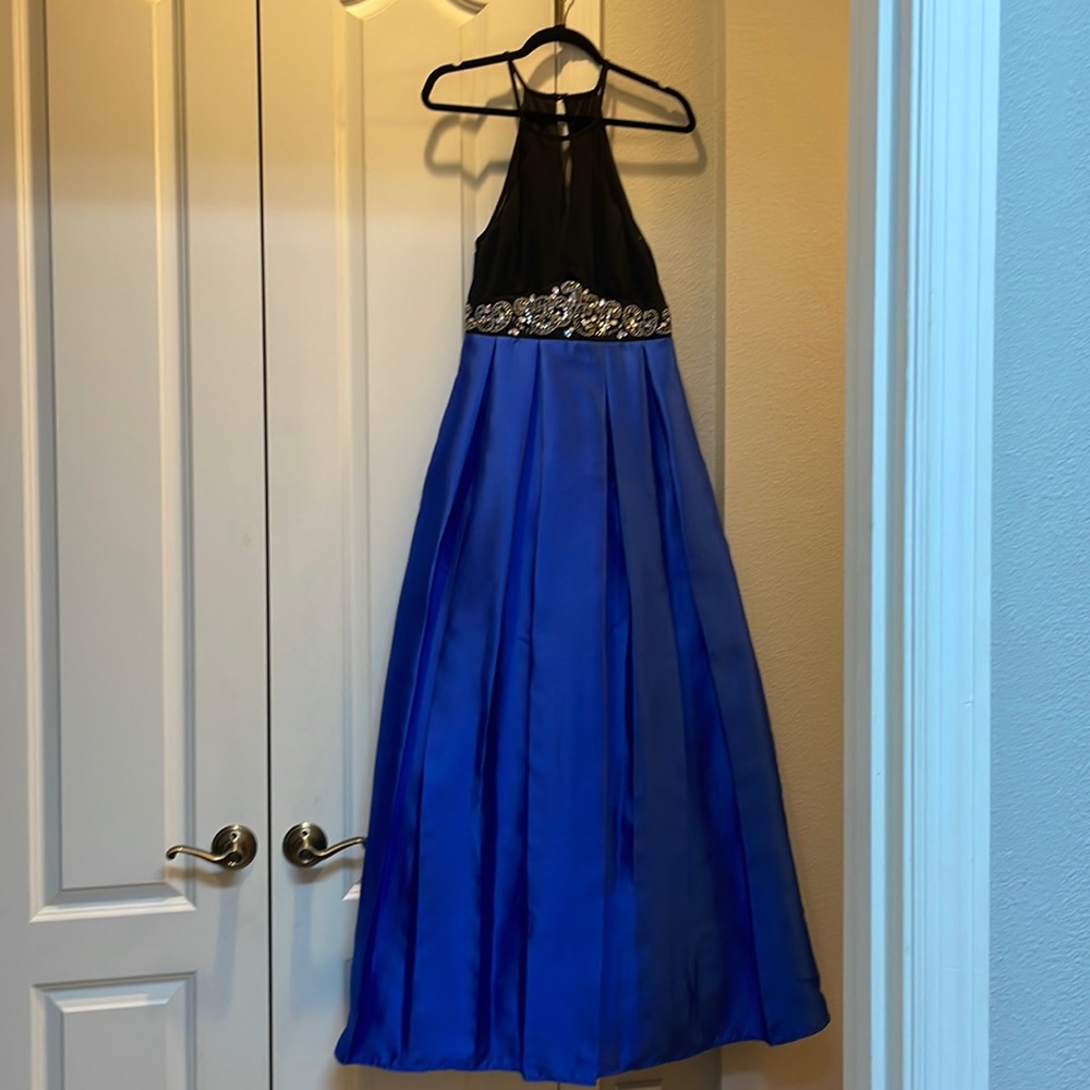 Nights by Teeze Me,  size 7/8, black and royal blue floor length with pockets.